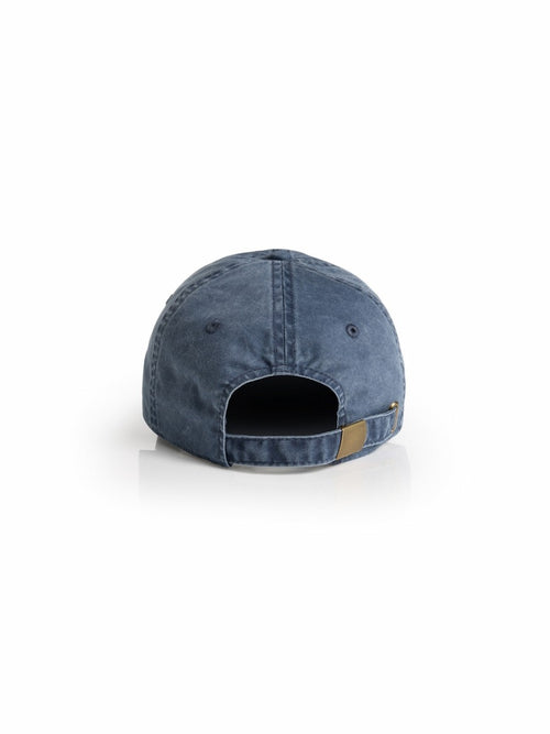 Blue denim cap on a white background from behind, showing a metal clasp