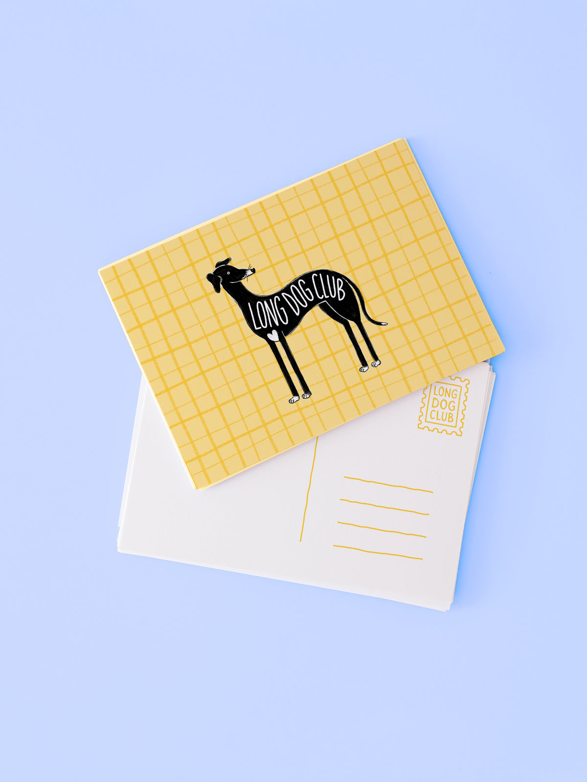 Yellow checkered postcard with a black dog illustration and 'Long Dog Club' text on a light blue background.