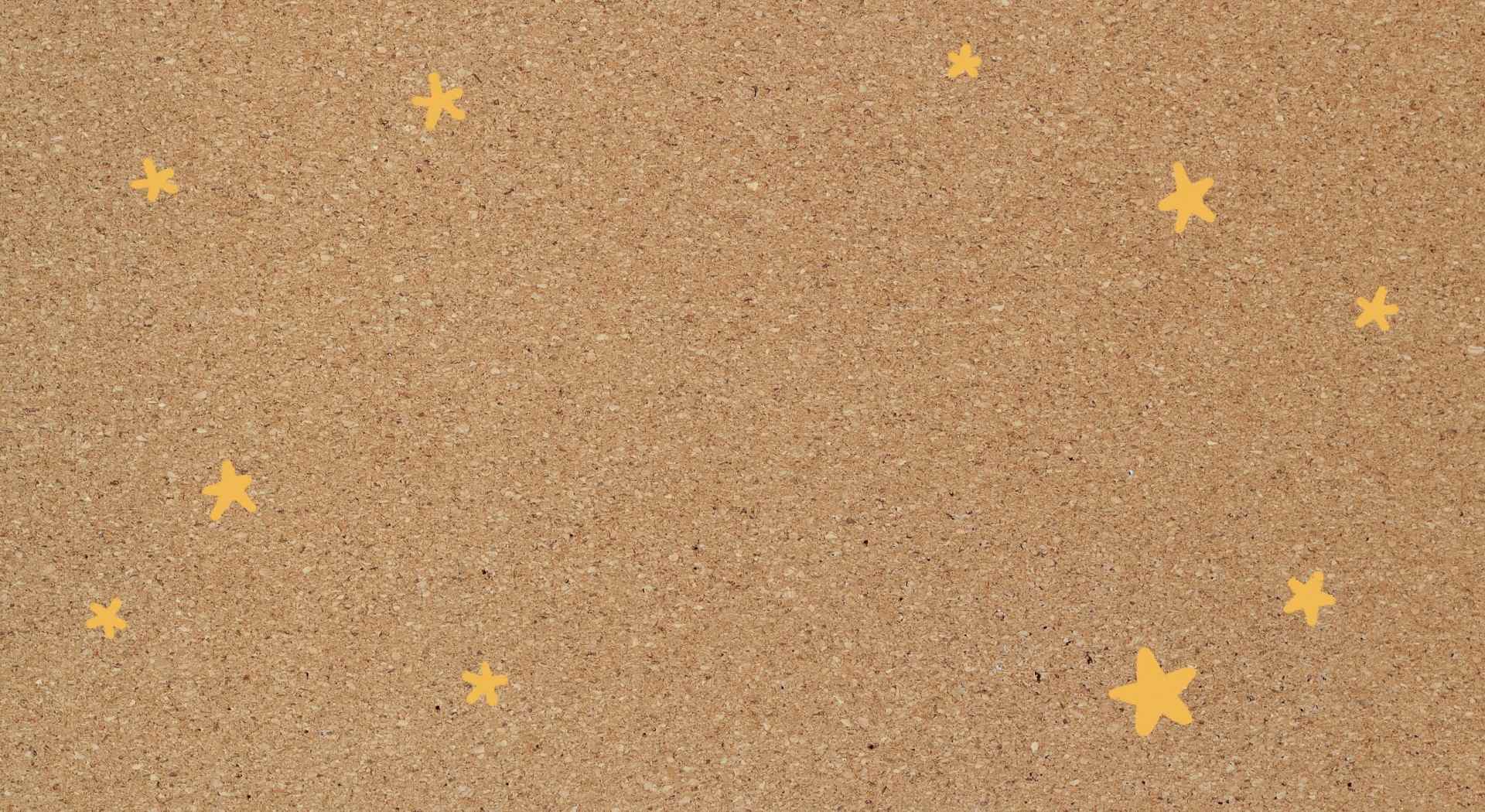 Brown corkboard background with yellow stars