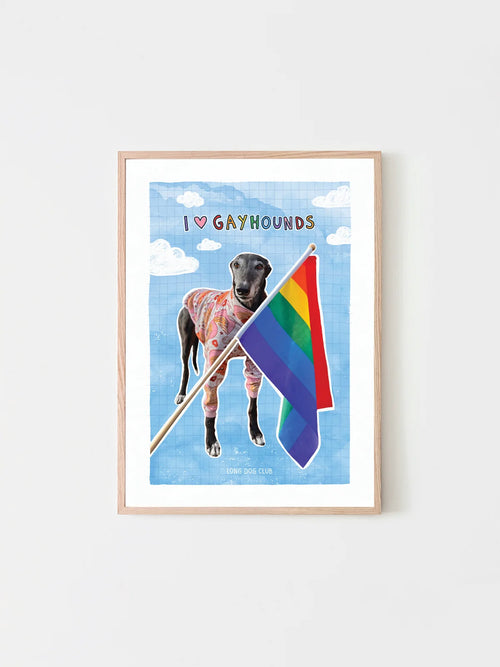 Framed artwork of a dog holding a rainbow flag with 'I ❤️ Gayhounds' text on a blue background.