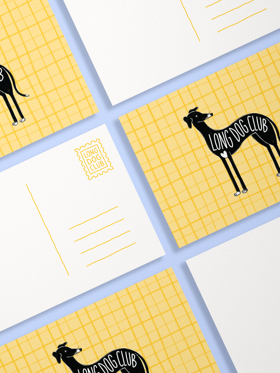 Postcards with black dog illustrations and 'Long Dog Club' text on a yellow and white checkered background.