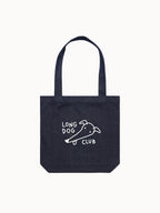 Denim tote bag with 'Long Dog Club' text and greyhound graphic on a white background